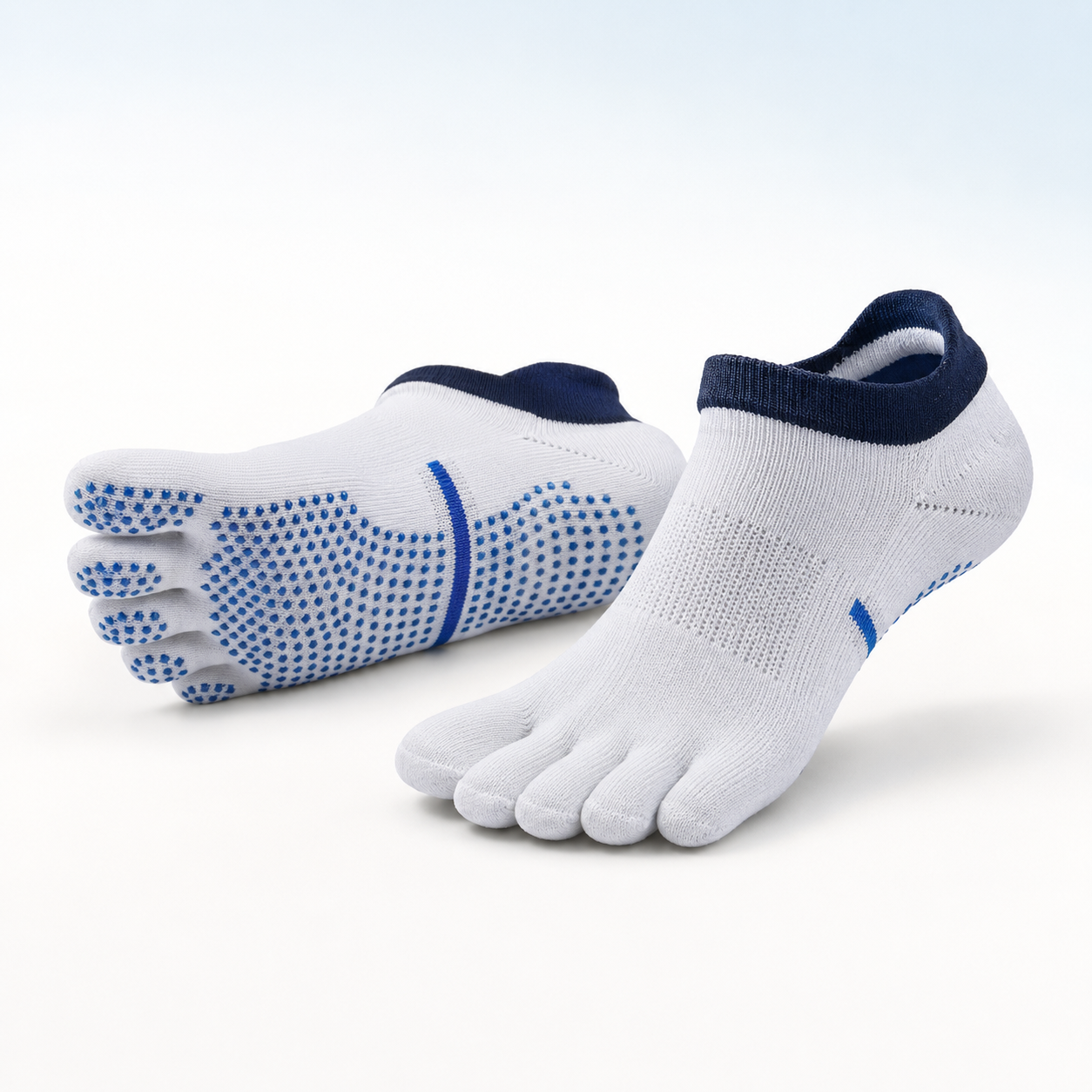 White low-rise five-toe grip socks with navy cuff and blue sole grips