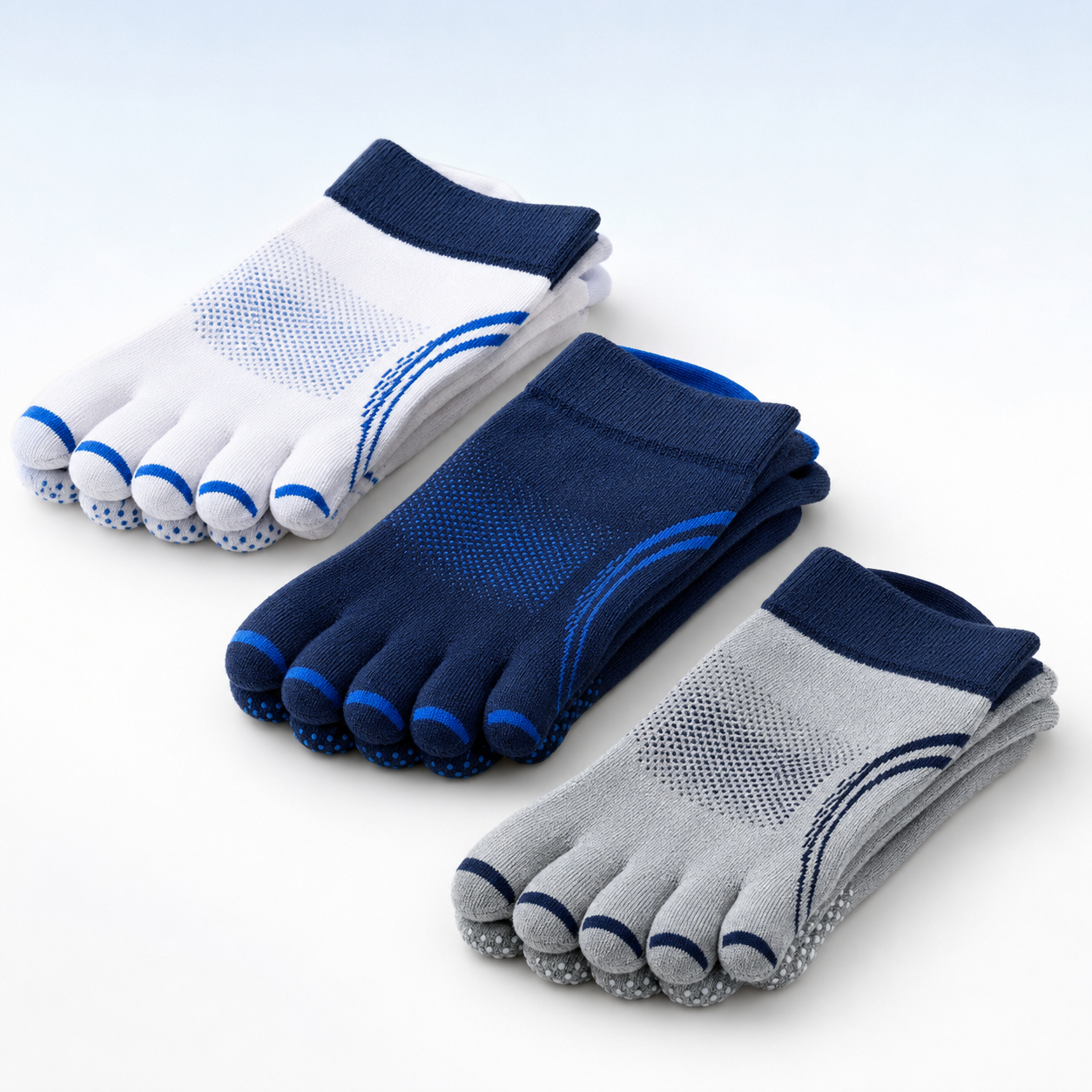Three-pair starter pack of white navy and grey five-toe grip socks